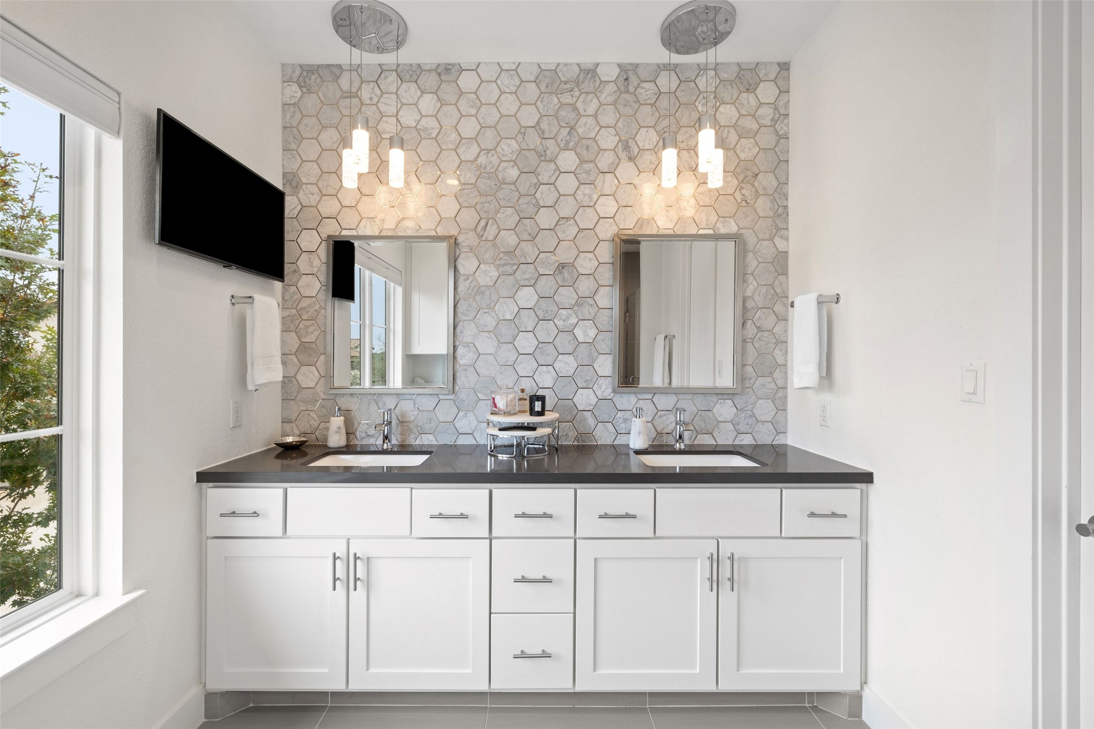 408 Rose Branch Way, Unit 24 Austin, TX 78738 - Photo 26 of 39 Bathroom with double vanity and light tile patterned flooring