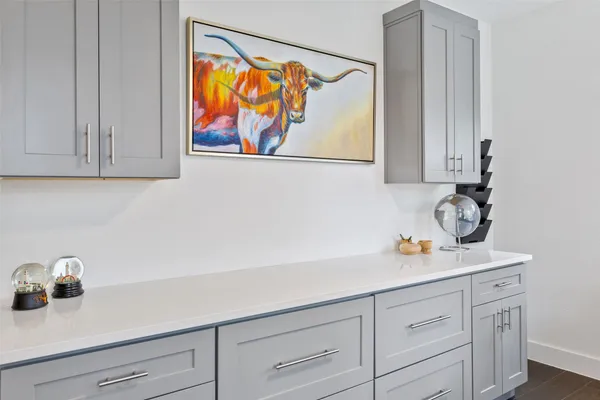 a view of cabinets and wooden floor