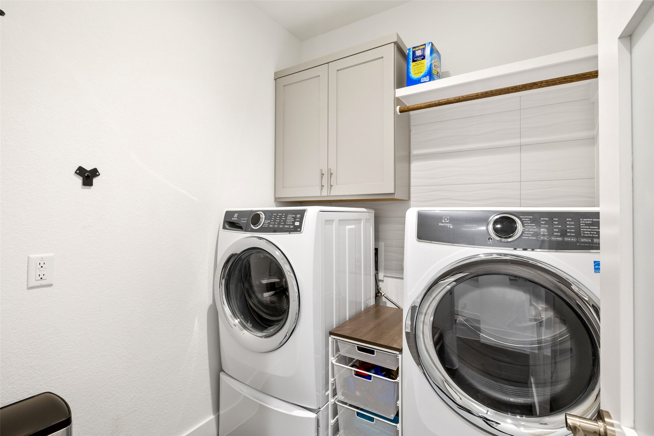 408 Rose Branch Way, Unit 24 Austin, TX 78738 - Photo 36 of 39 Washroom with cabinet space and washing machine and clothes dryer