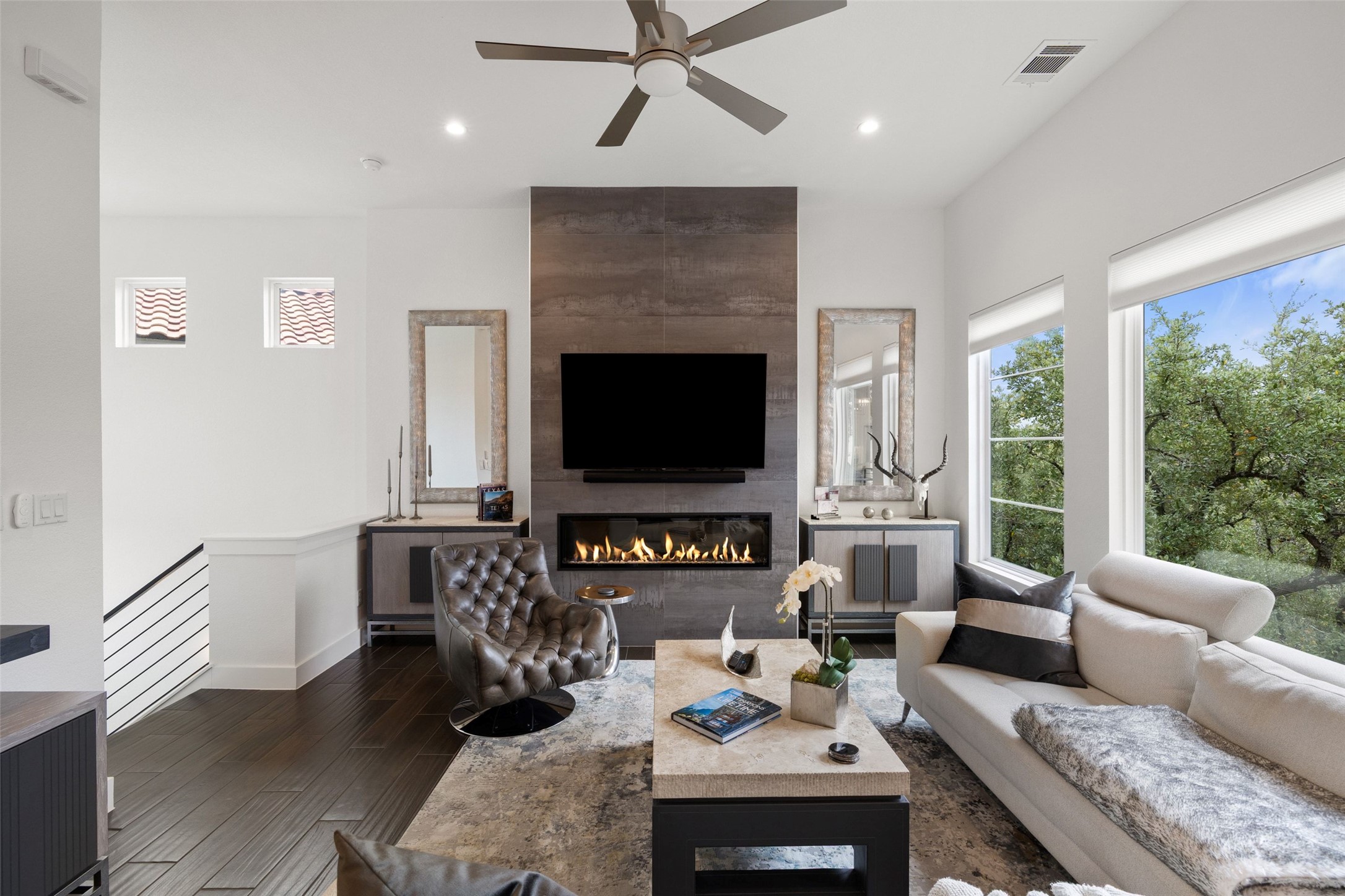 408 Rose Branch Way, Unit 24 Austin, TX 78738 - Photo 6 of 39 Living area with dark wood-type flooring, recessed lighting, a tile fireplace, and a ceiling fan
