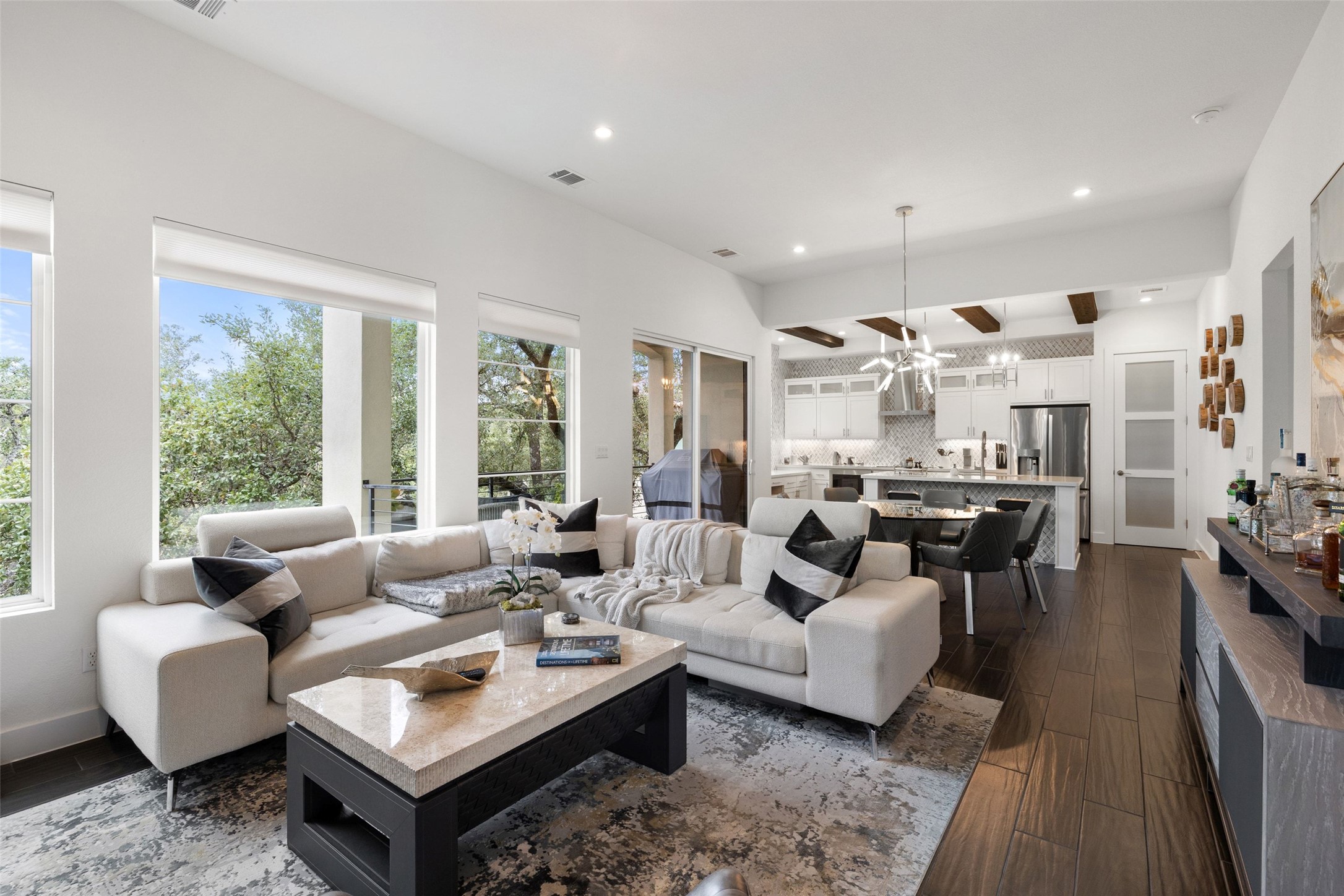 408 Rose Branch Way, Unit 24 Austin, TX 78738 - Photo 7 of 39 Living room featuring dark wood-style flooring and recessed lighting