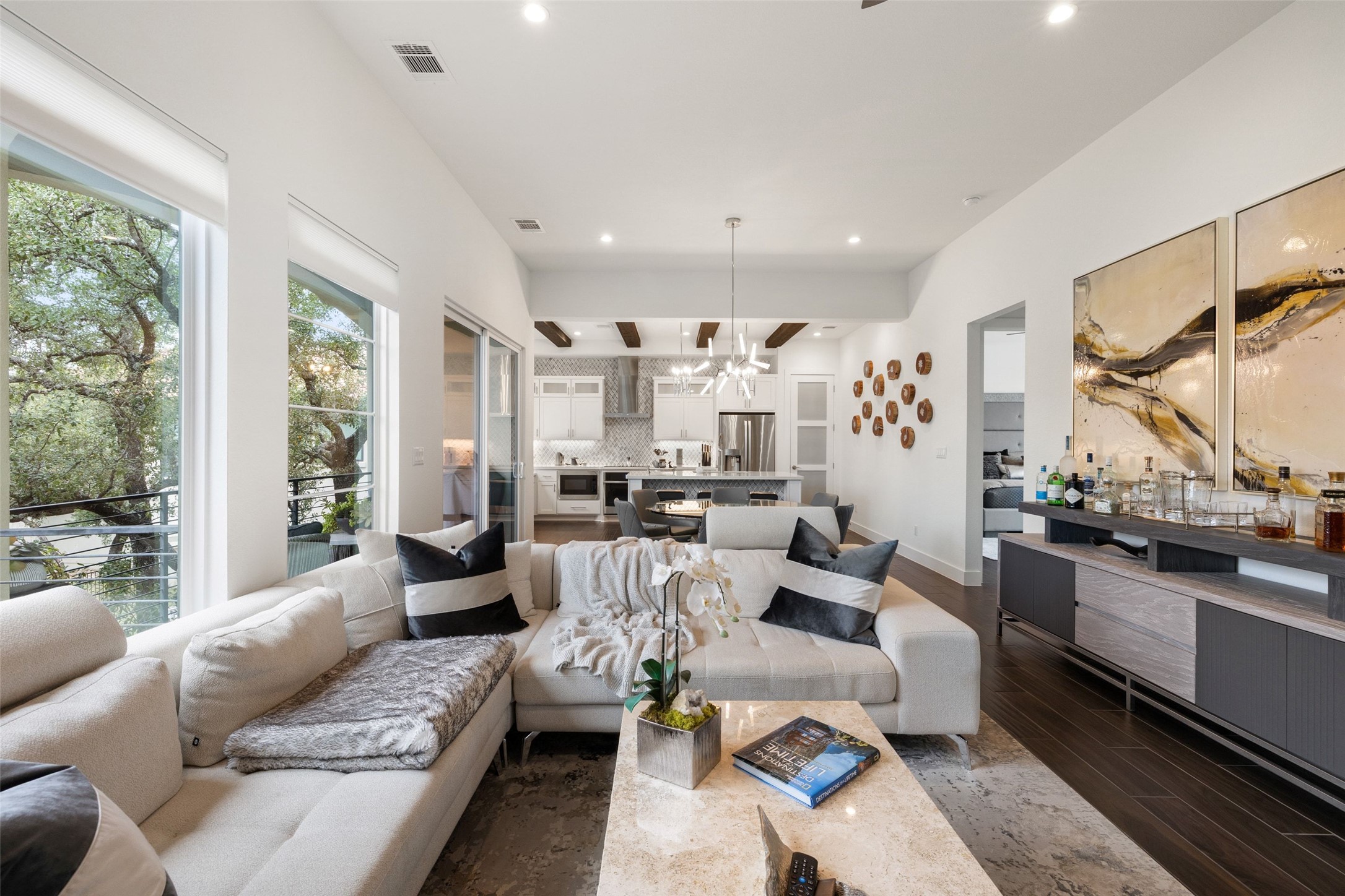 408 Rose Branch Way, Unit 24 Austin, TX 78738 - Photo 8 of 39 Living room with dark wood finished floors, a chandelier, and recessed lighting