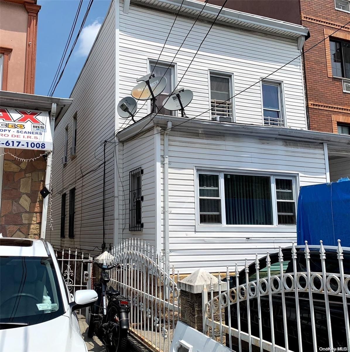 108-13 37th Avenue Queens, NY 11368 - Photo 1 of 1 a view of a house with a porch