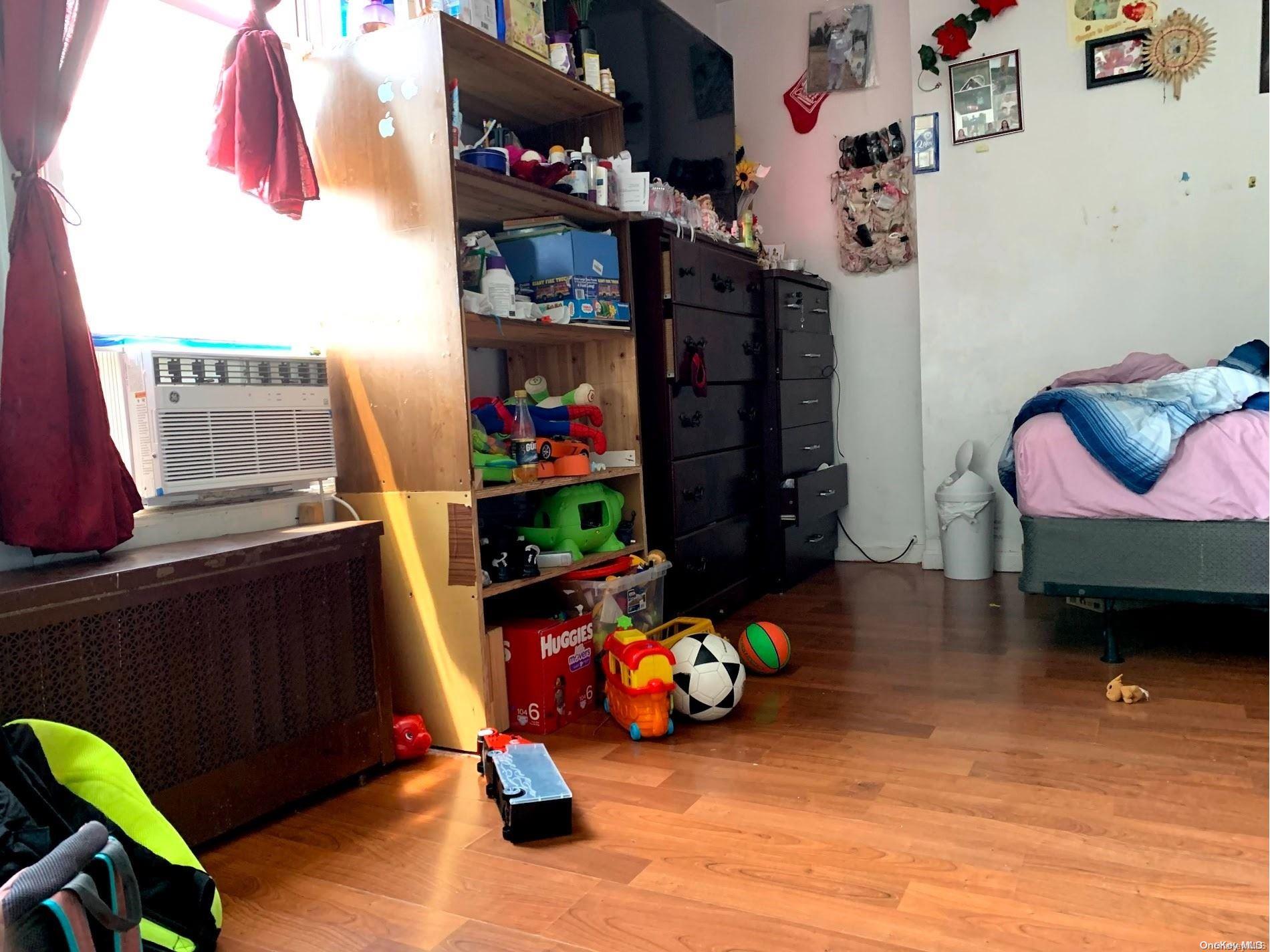 108-13 37th Avenue Queens, NY 11368 - Photo 14 of 23 a view of a room with toys