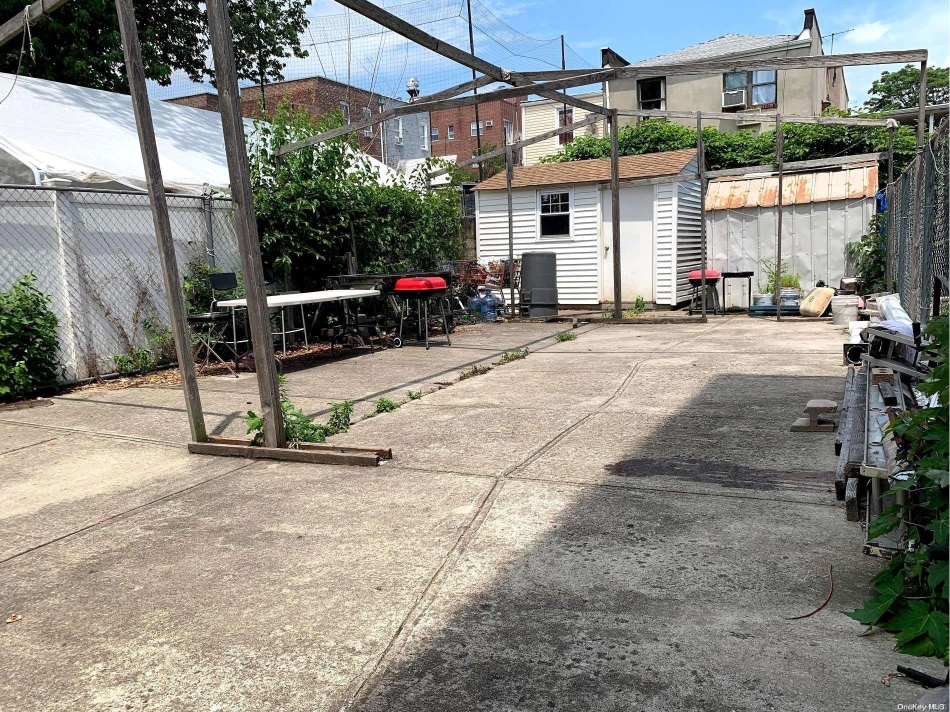 108-13 37th Avenue Queens, NY 11368 - Photo 9 of 23 a view of a street with sitting area