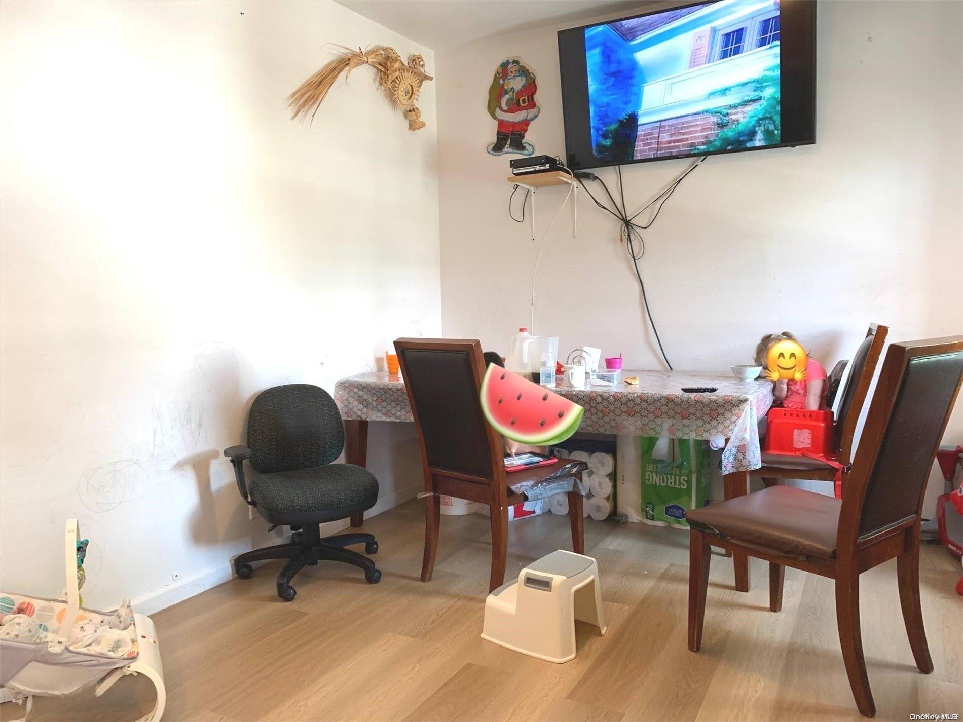 108-13 37th Avenue Queens, NY 11368 - Photo 10 of 23 a view of a workspace with furniture