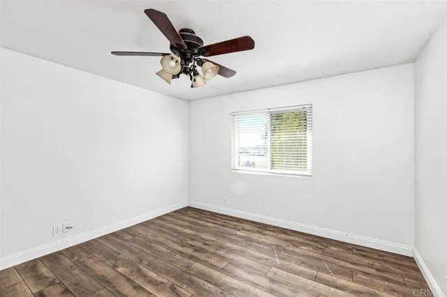 a living room with furniture fireplace and a flat screen tv
