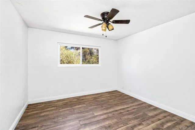 a bedroom with a bed and a fireplace