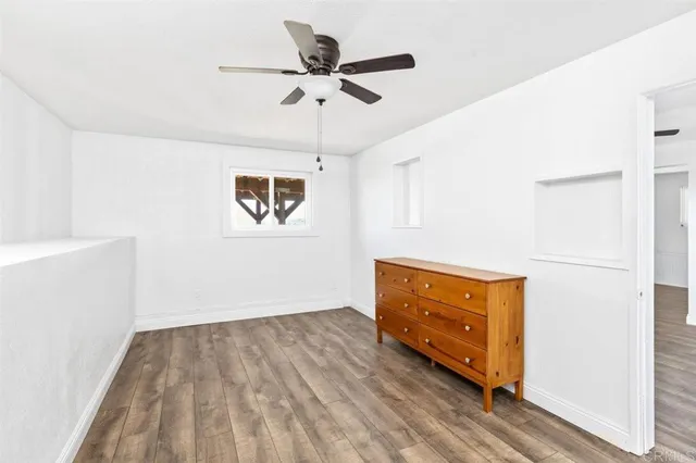 an aerial view of residential house and green space