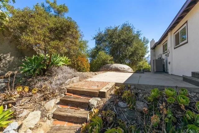 a view of a chairs and table on the terrace