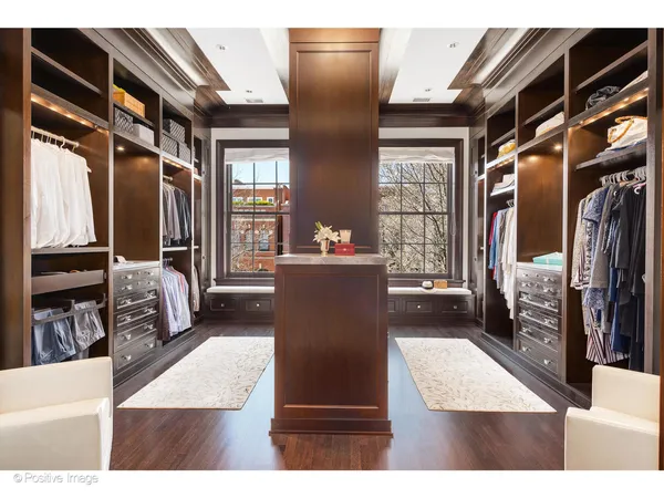 a living room with furniture and a night stand