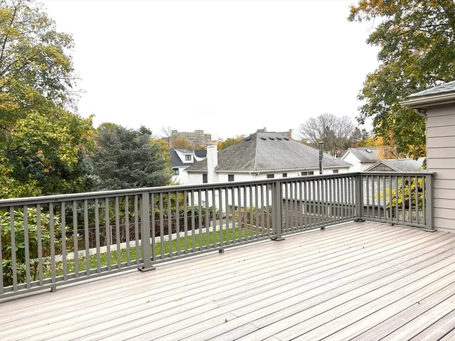 a view of a wooden roof deck