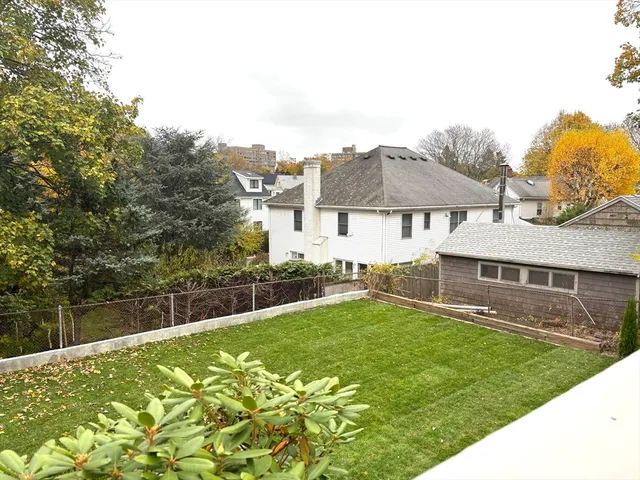 a house with garden in front of it