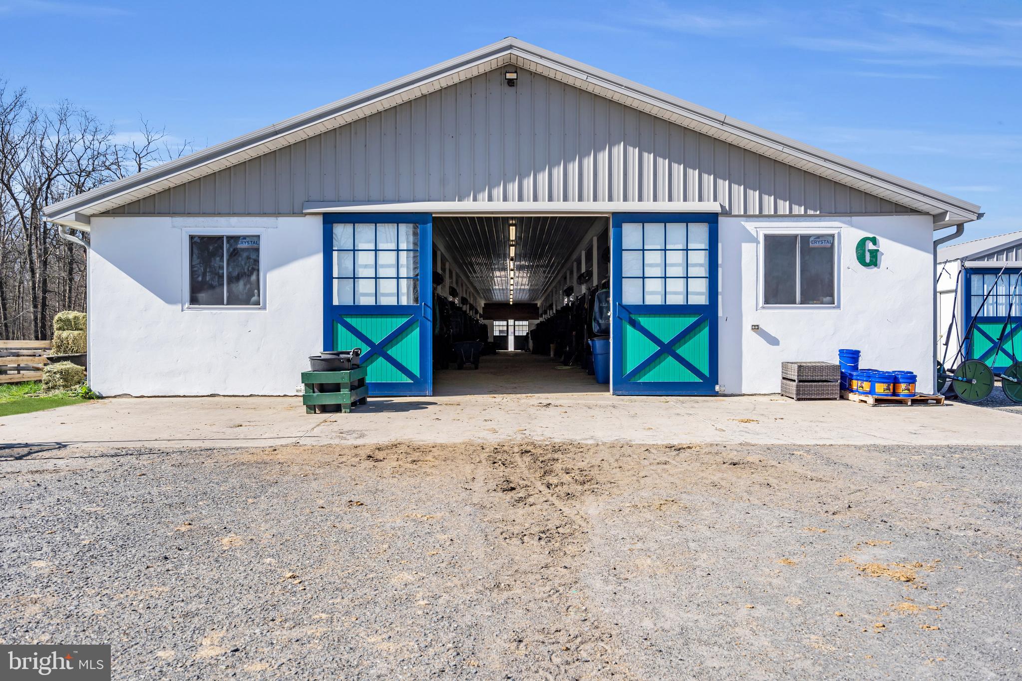 935 Lakewood Farmingdale Road Howell, NJ 07731 - Photo 15 of 28 a front view of a house with a yard and a garage