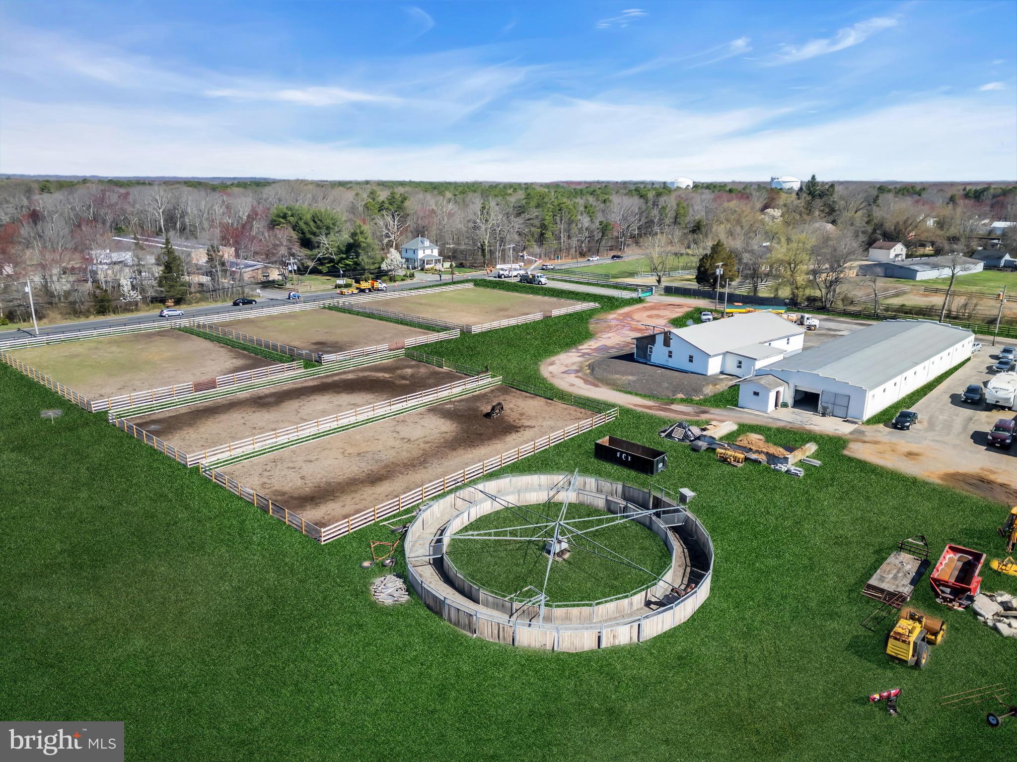 935 Lakewood Farmingdale Road Howell, NJ 07731 - Photo 27 of 28 an aerial view of a house with outdoor space and trees all around