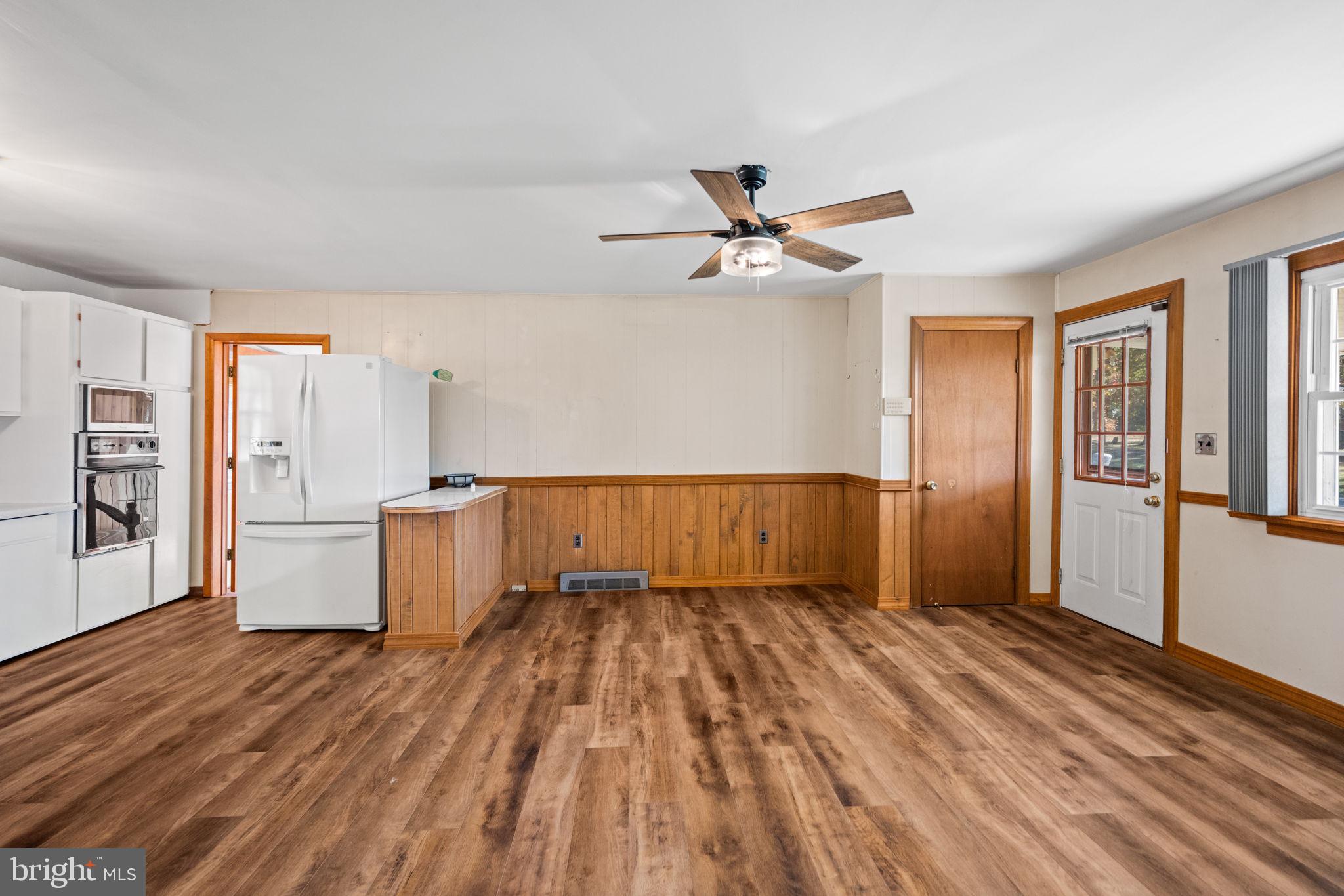3744 Back Woods Road Westminster, MD 21158 - Photo 21 of 62 a view of empty room with wooden floor and fan