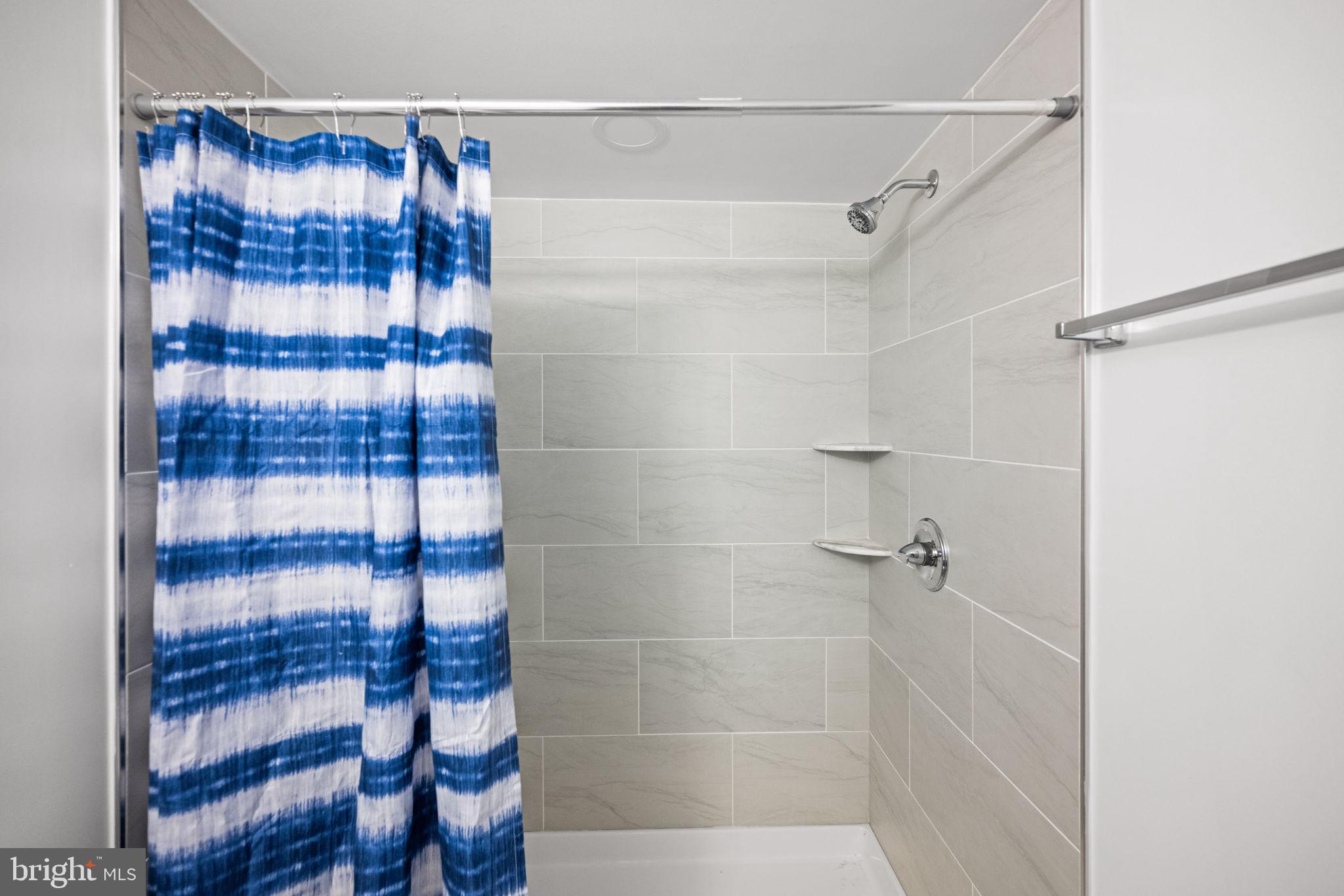 3744 Back Woods Road Westminster, MD 21158 - Photo 37 of 62 a bathroom with a shower