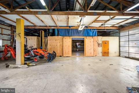 a view of a yard with an outdoor space