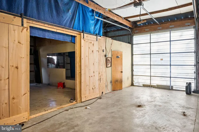 a view of a back yard of the house