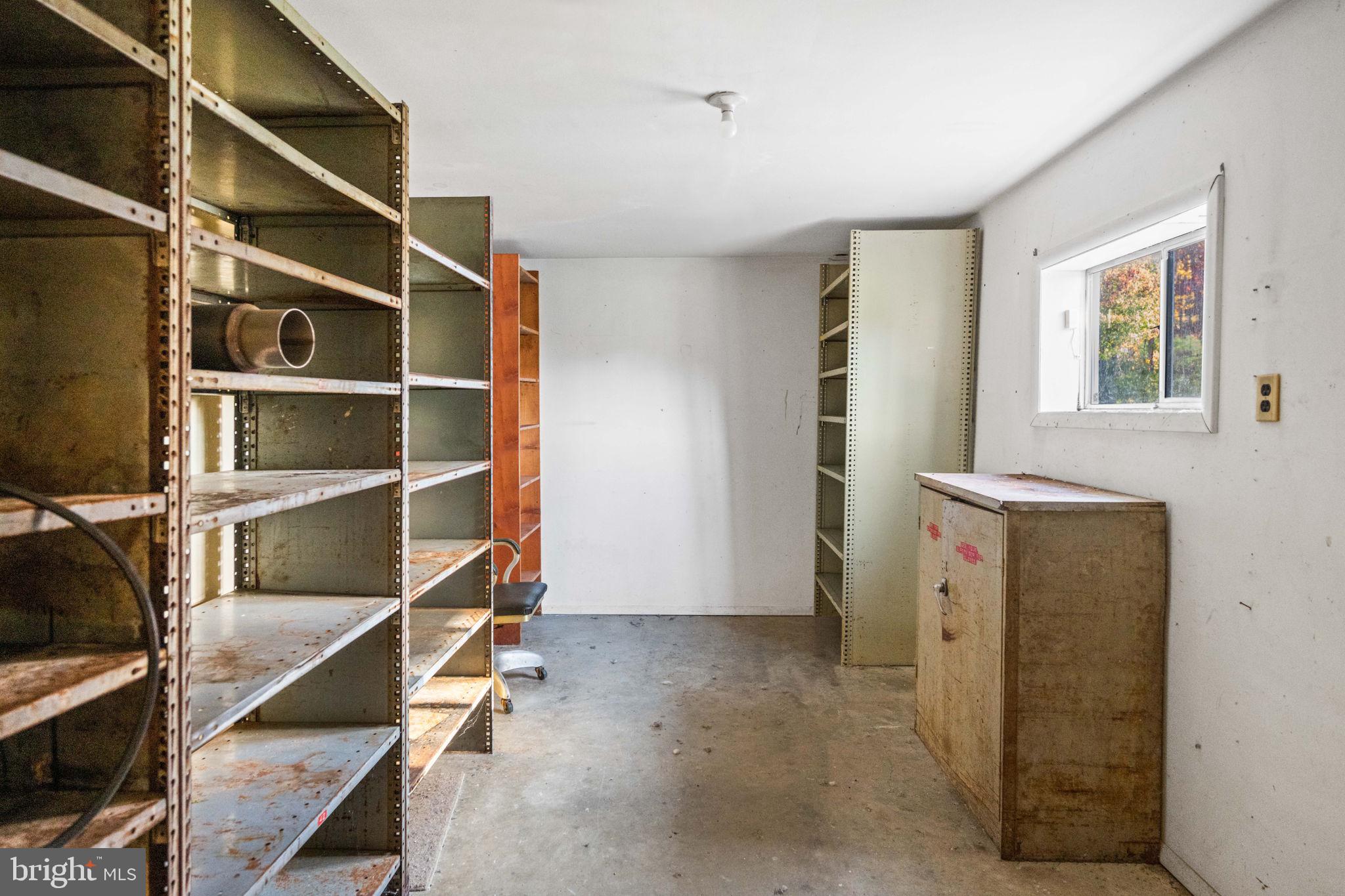3744 Back Woods Road Westminster, MD 21158 - Photo 49 of 62 a view of walk in closet with empty racks