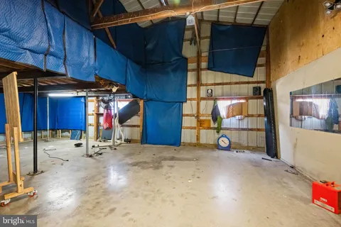 a view of a swimming pool with a yard