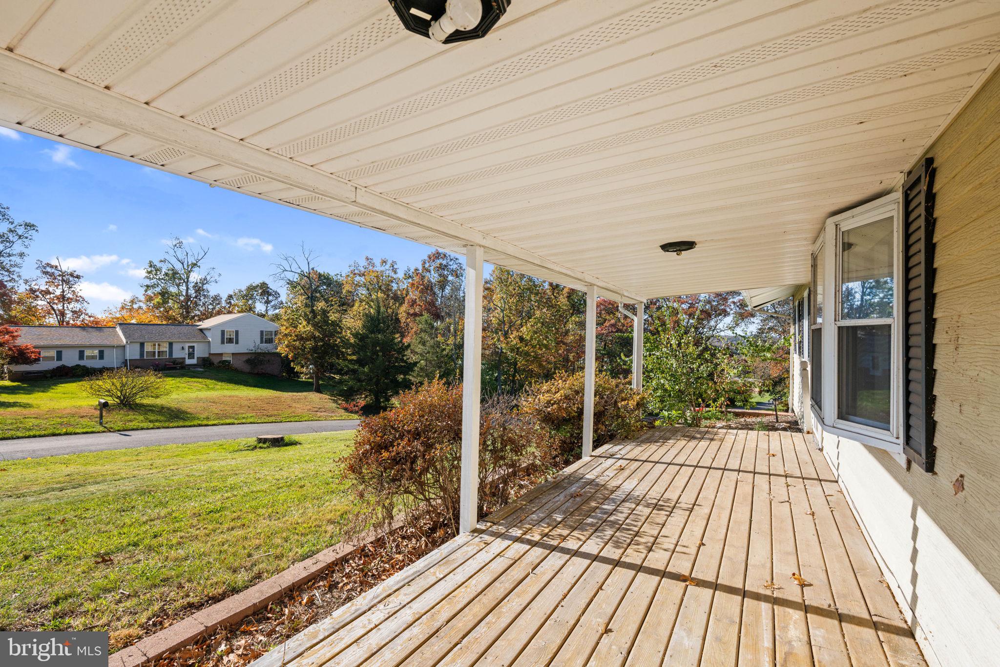3744 Back Woods Road Westminster, MD 21158 - Photo 7 of 62 a view of a swimming pool with a patio