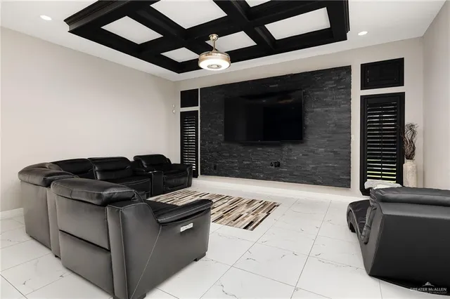 a kitchen with granite countertop a stove and a microwave