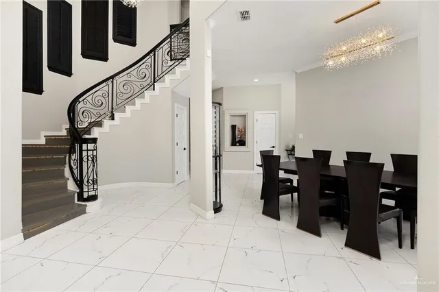 a view of a dining room with lots of furniture and floor