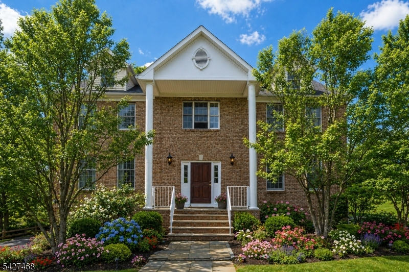 20 Sleepy Hollow Road Denville, NJ 07834 - Photo 1 of 49 a front view of a house with a yard