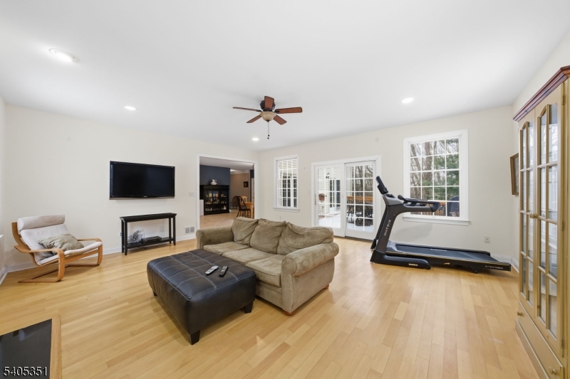 20 Sleepy Hollow Road Denville, NJ 07834 - Photo 13 of 49 a living room with furniture and a flat screen tv