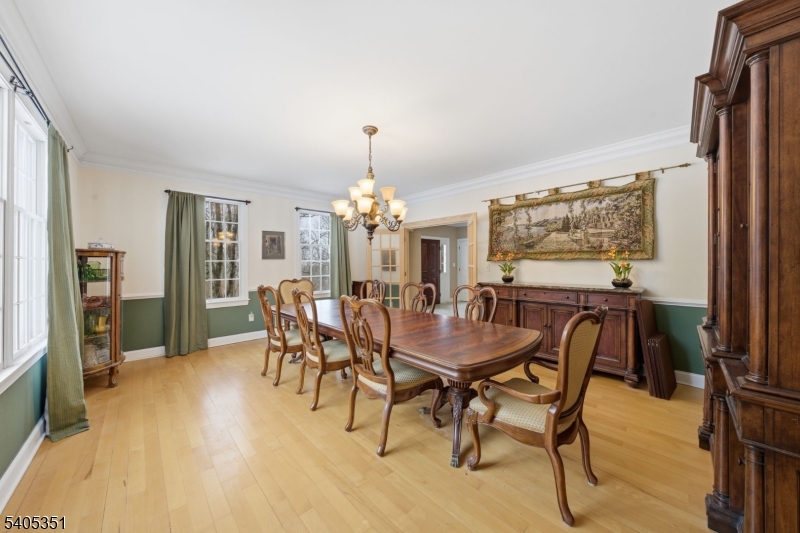 20 Sleepy Hollow Road Denville, NJ 07834 - Photo 23 of 49 a view of a dining room with furniture and chandelier