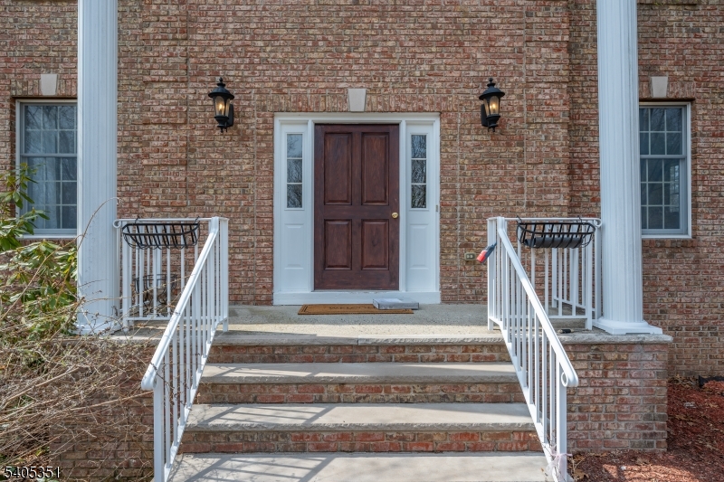 20 Sleepy Hollow Road Denville, NJ 07834 - Photo 40 of 49 a front view of a house with stairs