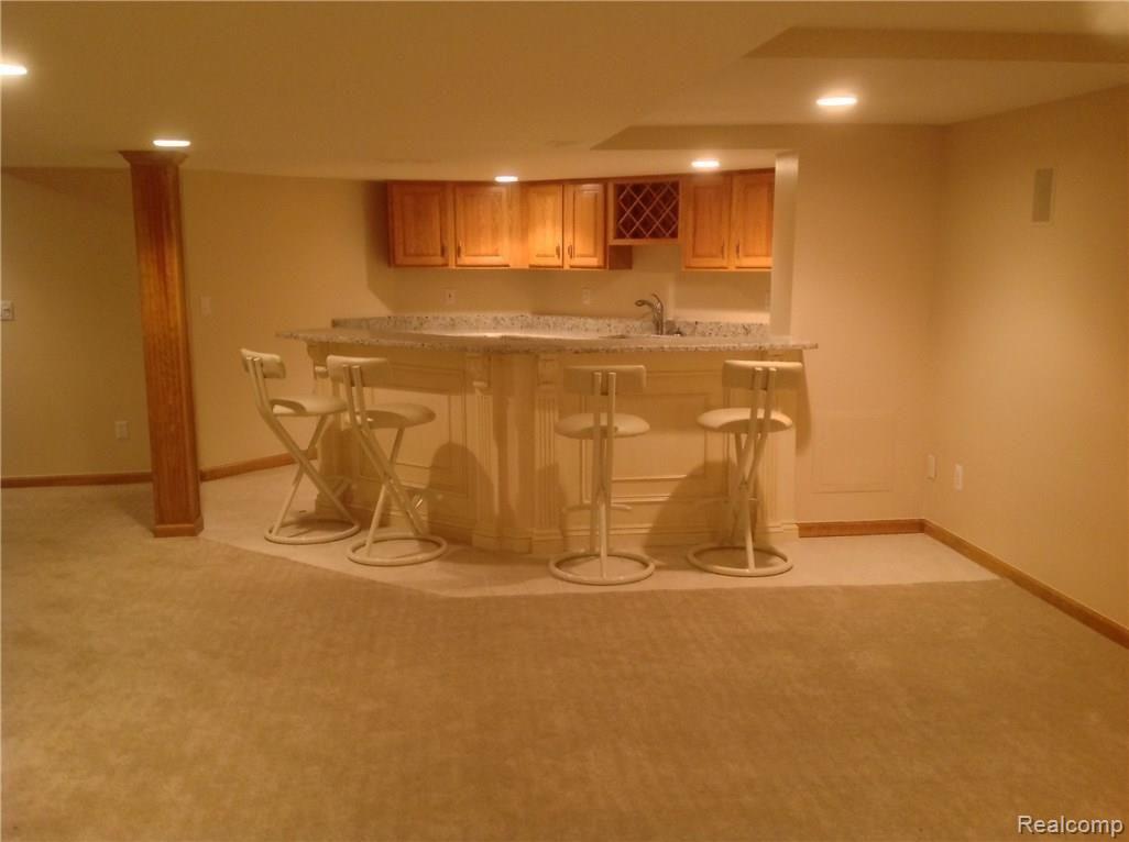1405 Ridge Court Rochester, MI 48306 - Photo 24 of 34 Finished Basement with Bar area