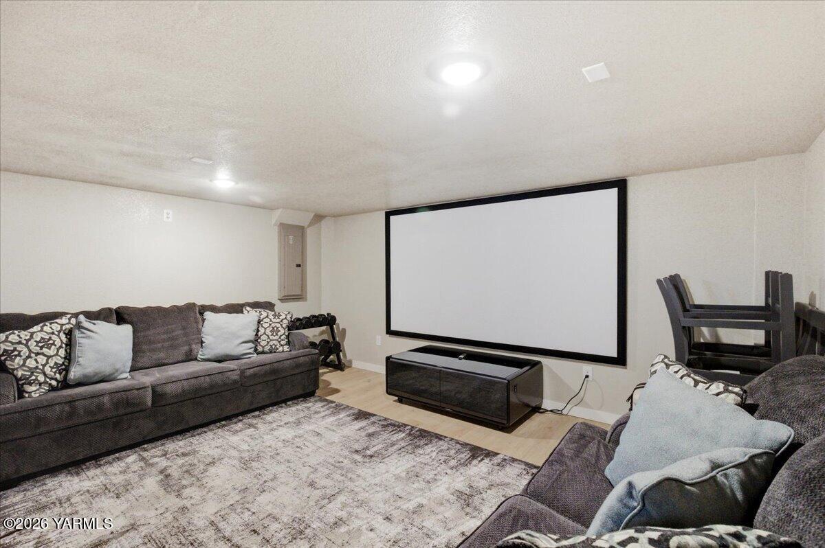 23 Shafer Avenue Naches, WA 98937 - Photo 18 of 29 a living room with furniture and a flat screen tv