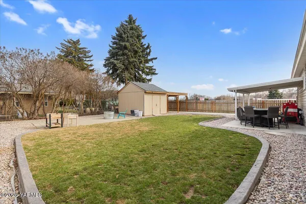 a house with yard in front of it