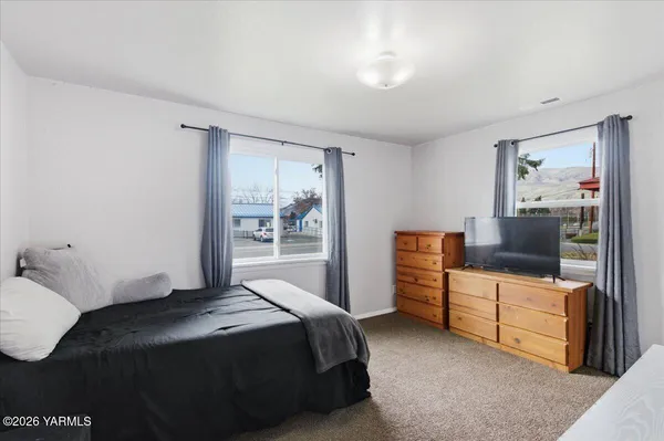 a view of a livingroom with a flat screen tv