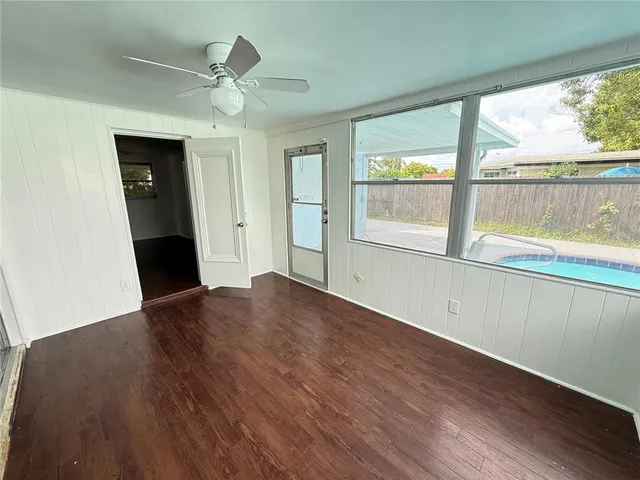 a view of an empty room and window