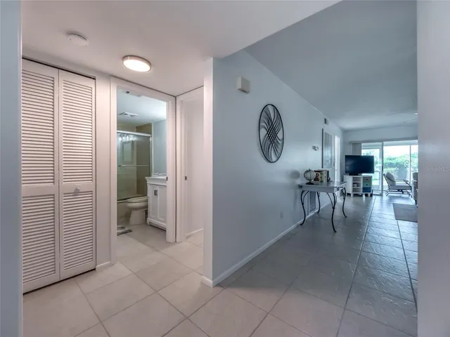 a view of room with furniture and wooden floor