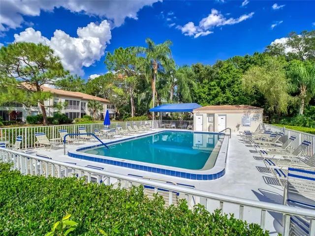 a view of a house with a swimming pool