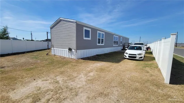a front view of a house with a garage