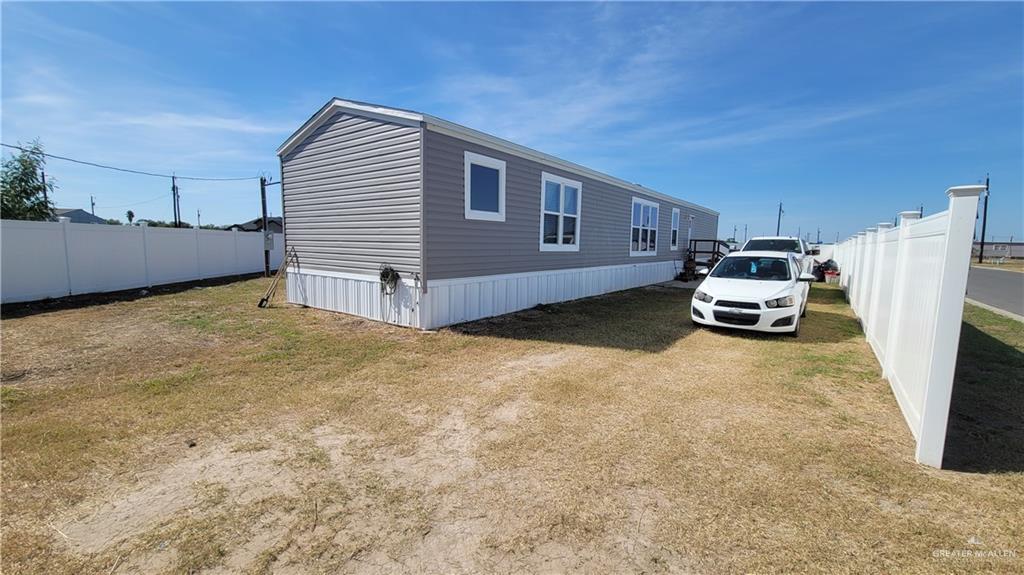 a front view of a house with a garage