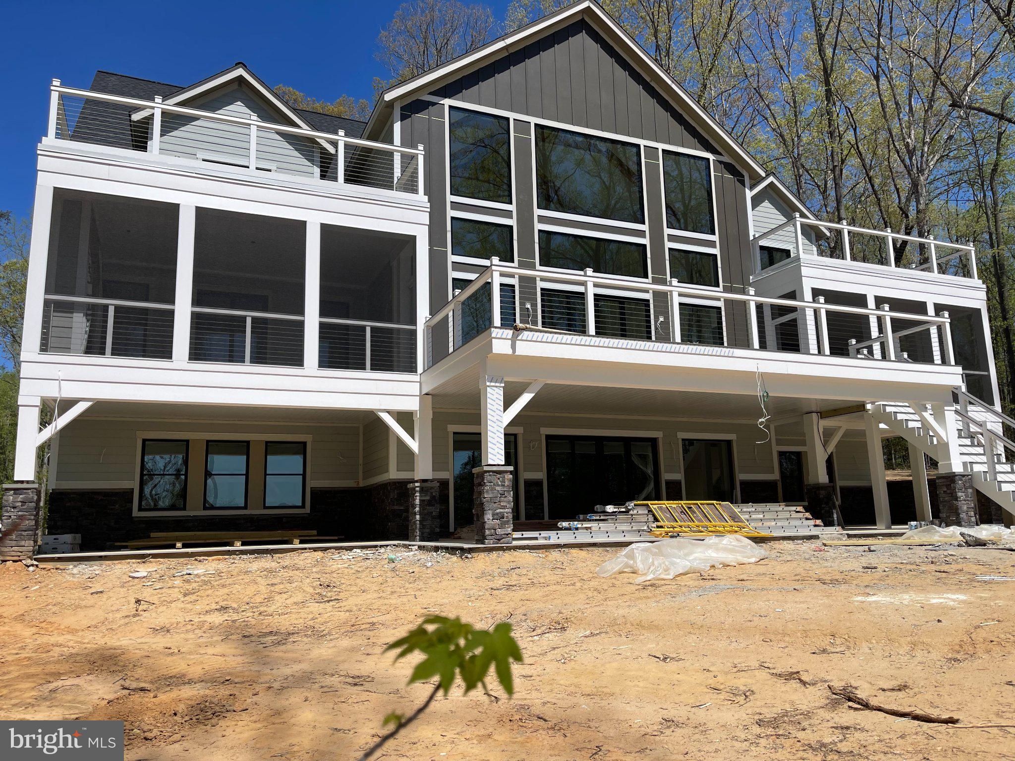 290 Carrs Bridge Road Mineral, VA 23117 - Photo 6 of 38 Modern lakeside retreat under construction.