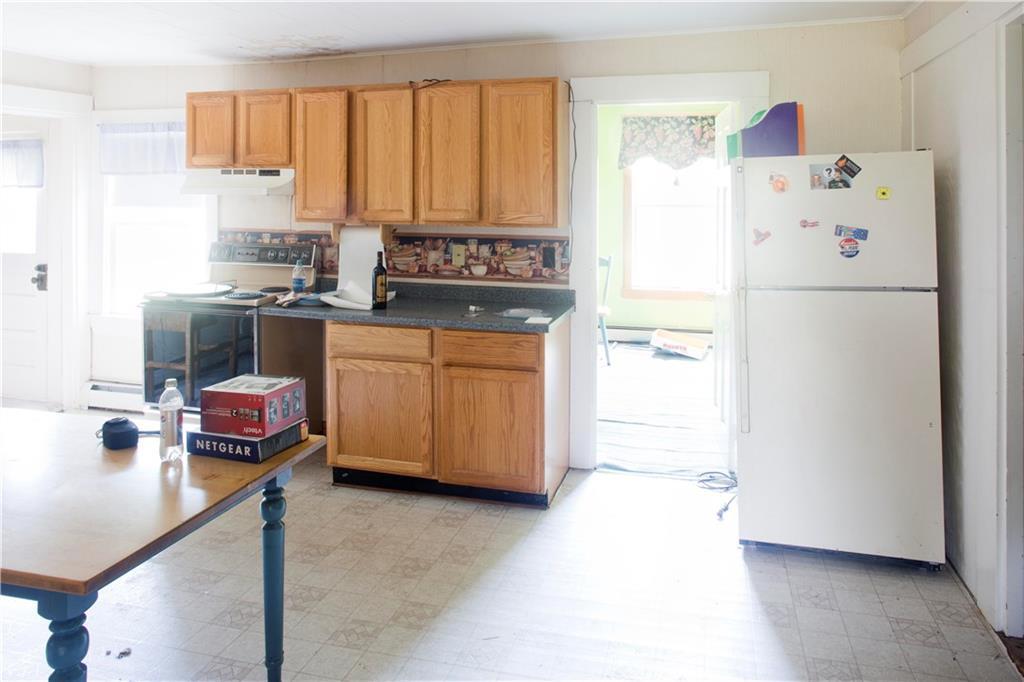 241 Canaan Road Hampden, ME 04444 - Photo 10 of 32 Kitchen with office next to fridge