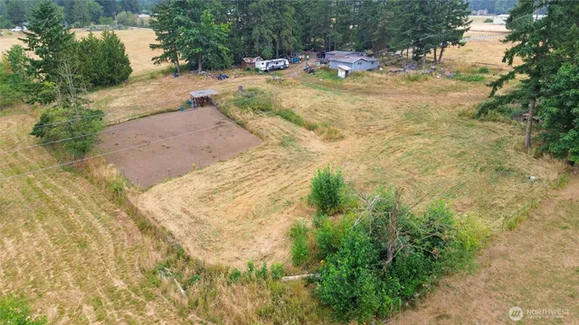 a view of a yard with swimming pool