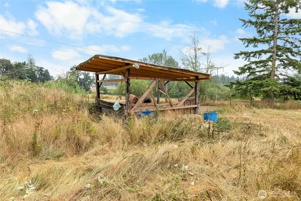 a view of a yard with a slide
