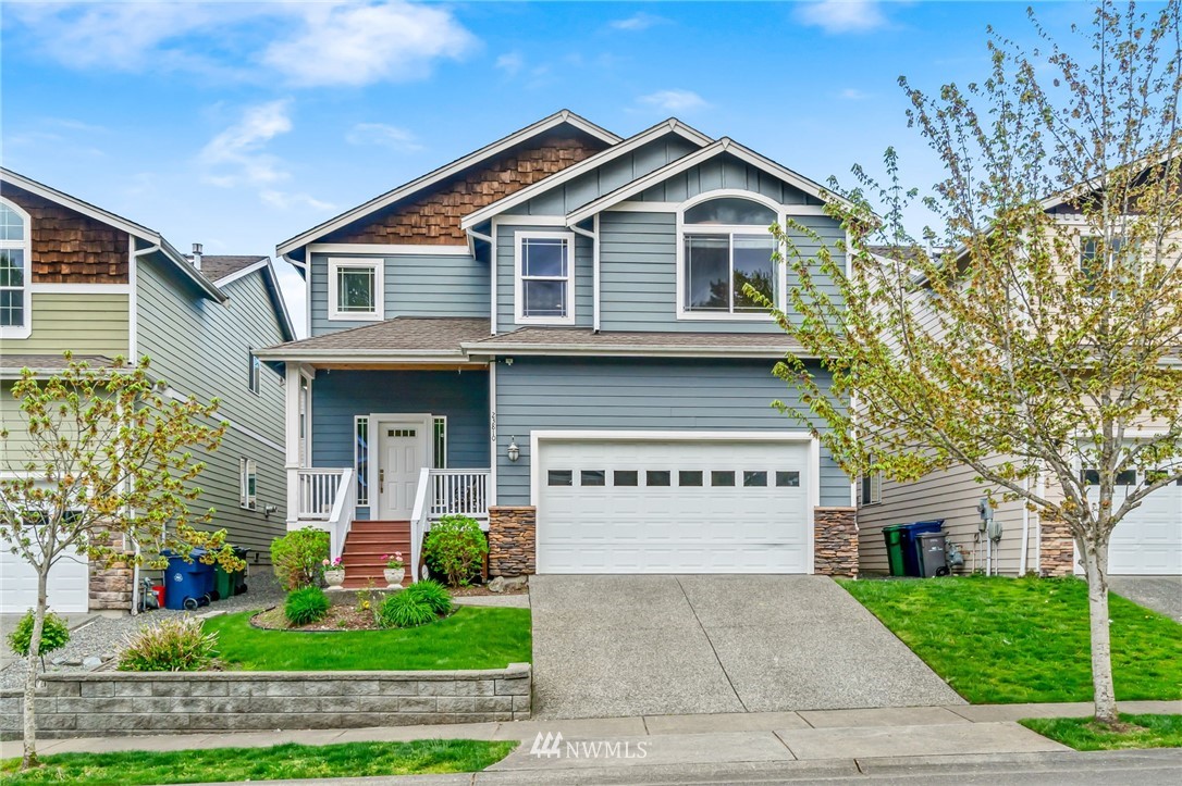 23810 17th Avenue West Bothell, WA 98021 - Photo 1 of 1 a view of a big house with a yard and plants