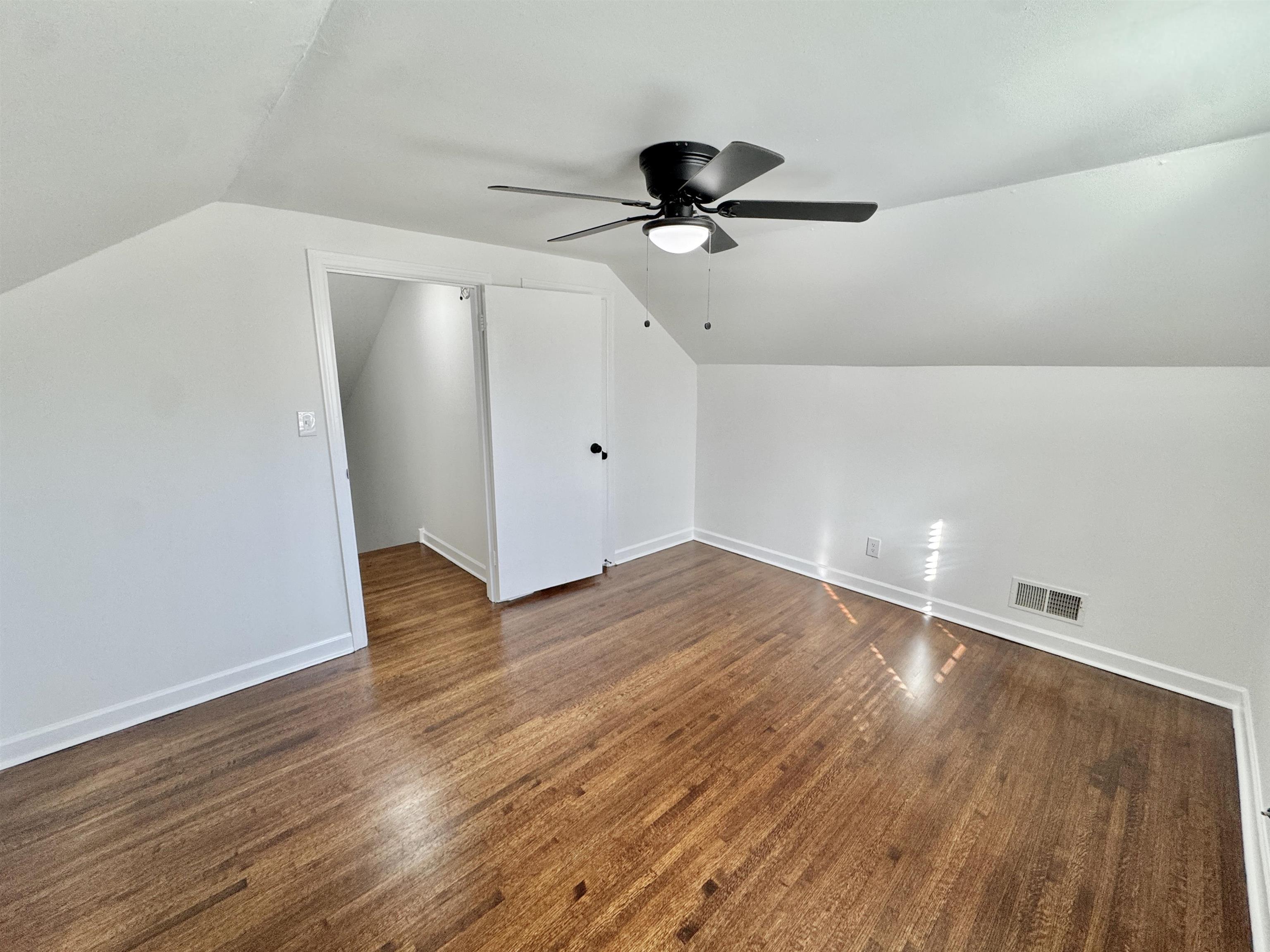 4417 Fair Meadow Road Memphis, TN 38117 - Photo 18 of 38 wooden floor in an empty room
