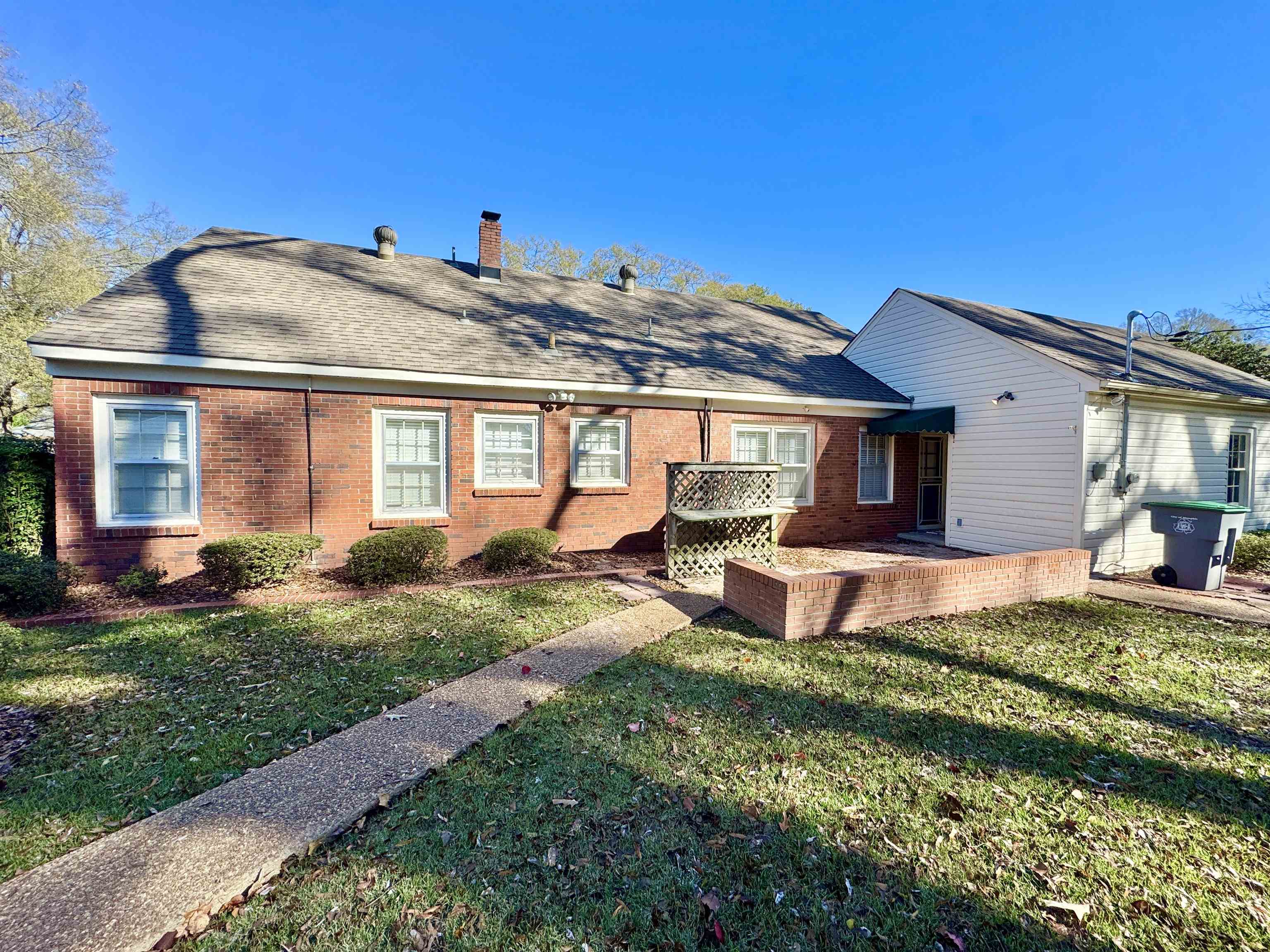 4417 Fair Meadow Road Memphis, TN 38117 - Photo 34 of 38 a front view of a house with a yard
