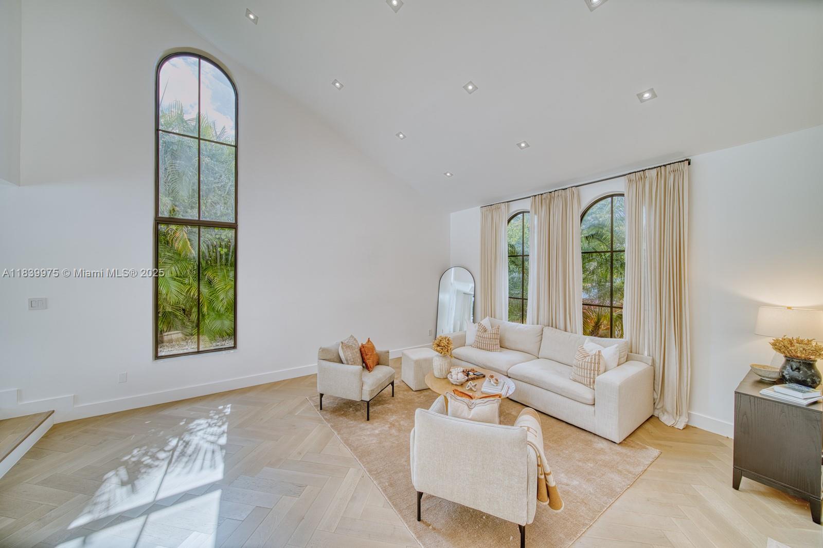 12480 Southwest 97th Street Miami, FL 33186 - Photo 17 of 64 a living room with furniture and a window