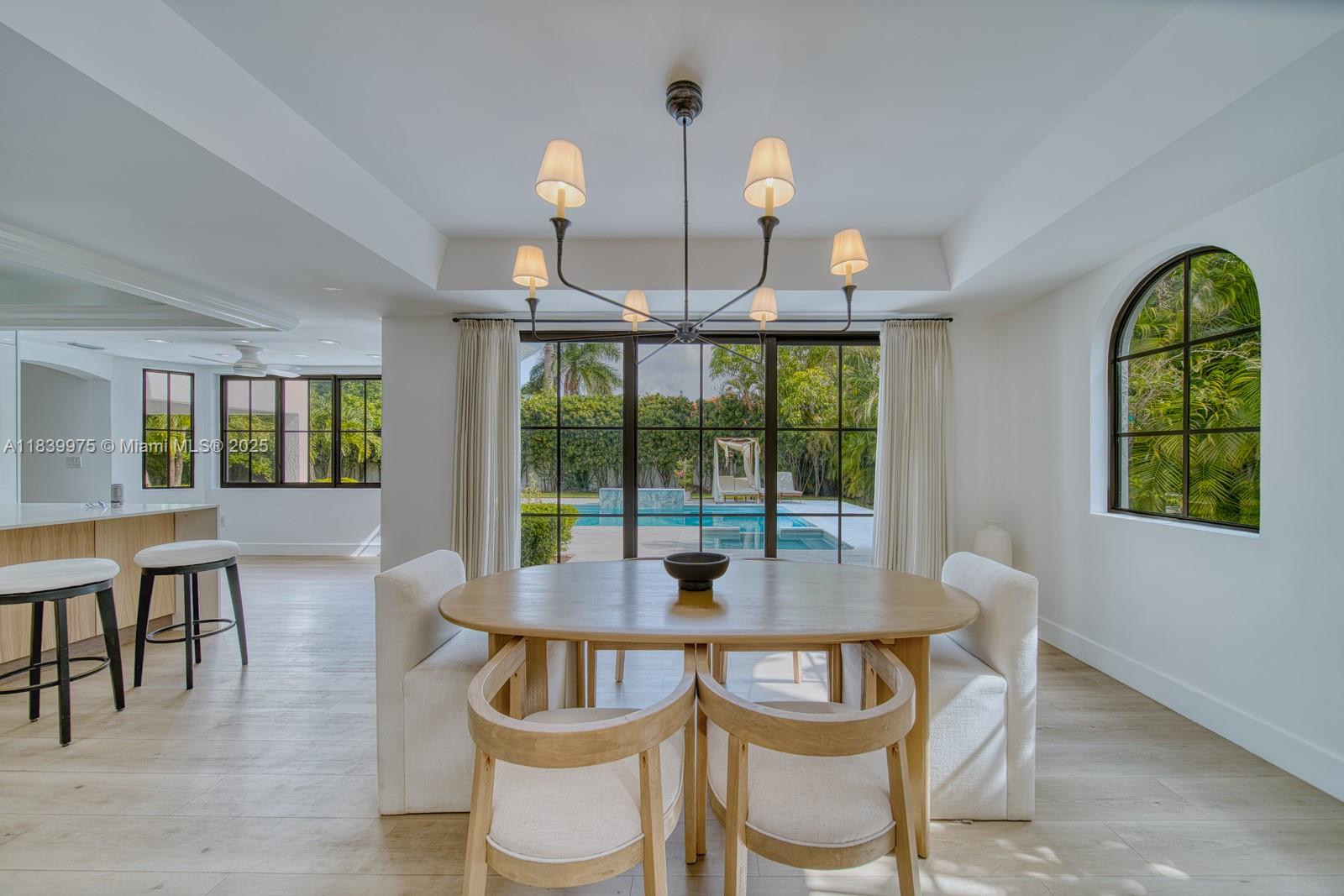 12480 Southwest 97th Street Miami, FL 33186 - Photo 19 of 64 a view of a dining room with furniture window and outside view